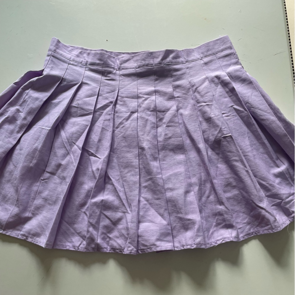 Lavender pleated mini skort